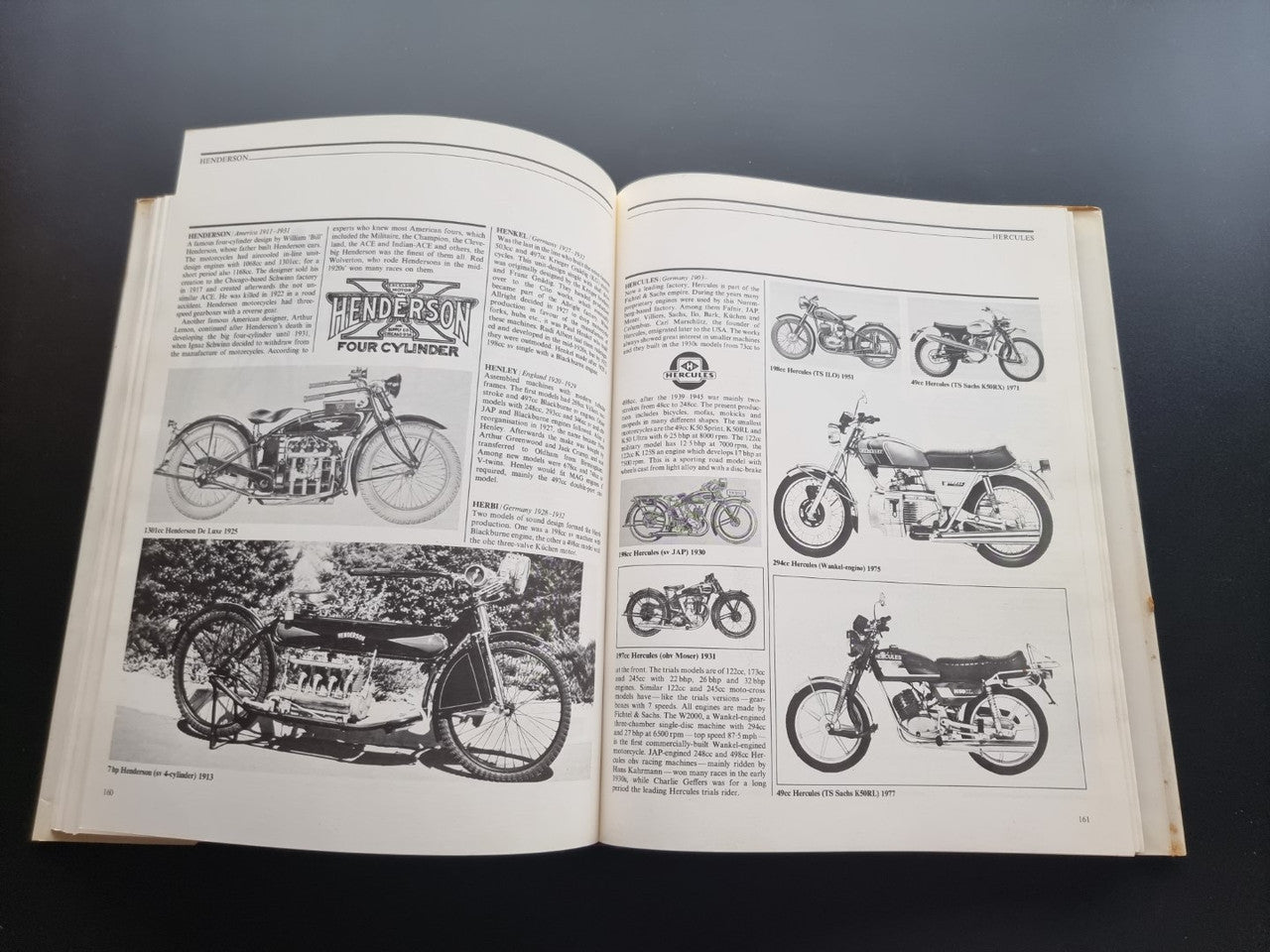Illustrated motorcycle encyclopedia book, open pages with photos and diagrams of motorcycles