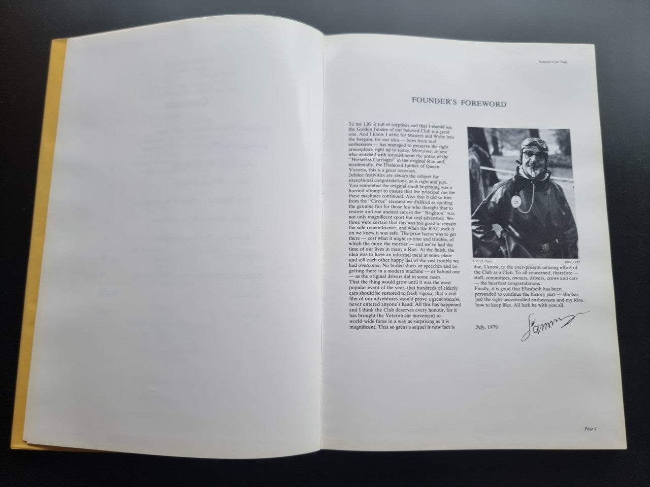 Open pictorial history book with founder’s foreword page and vintage portrait photo
