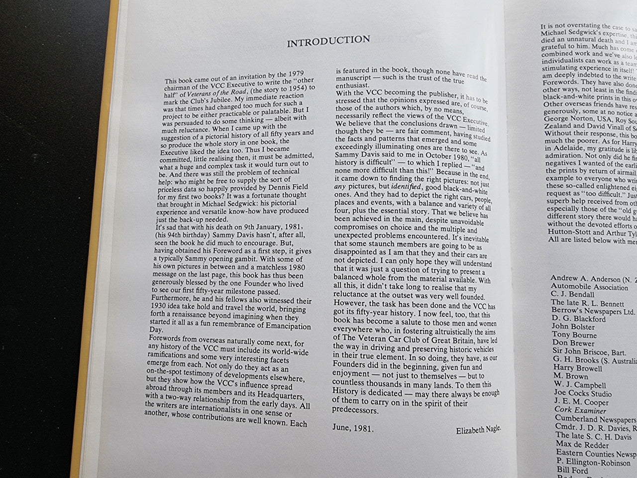 Pictorial history book, open introduction pages with dense text and author names