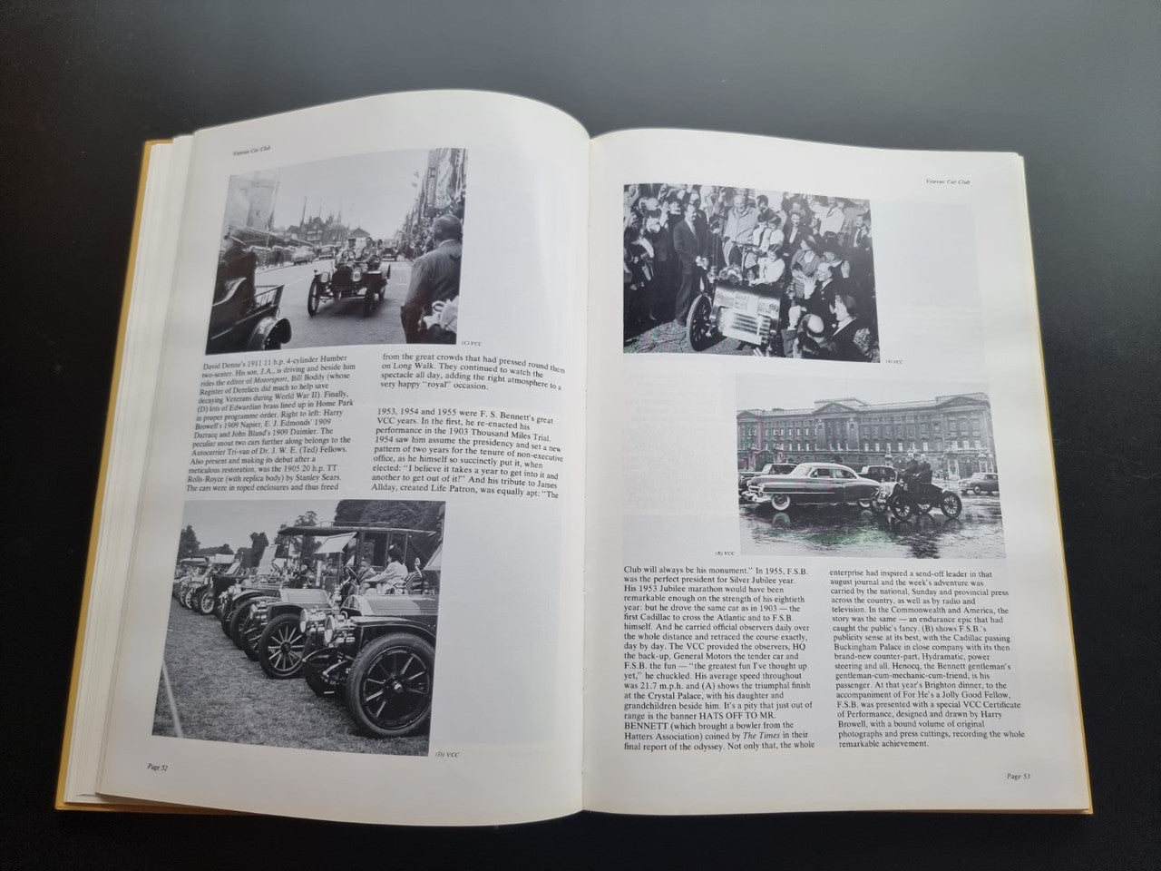 Open pictorial history book spread with black-and-white car and crowd photos