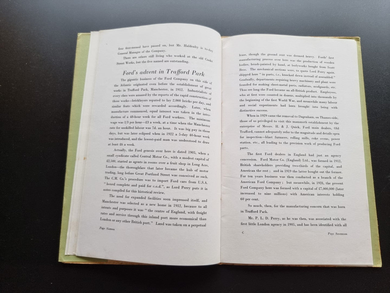 Opened book with printed text columns on both pages.