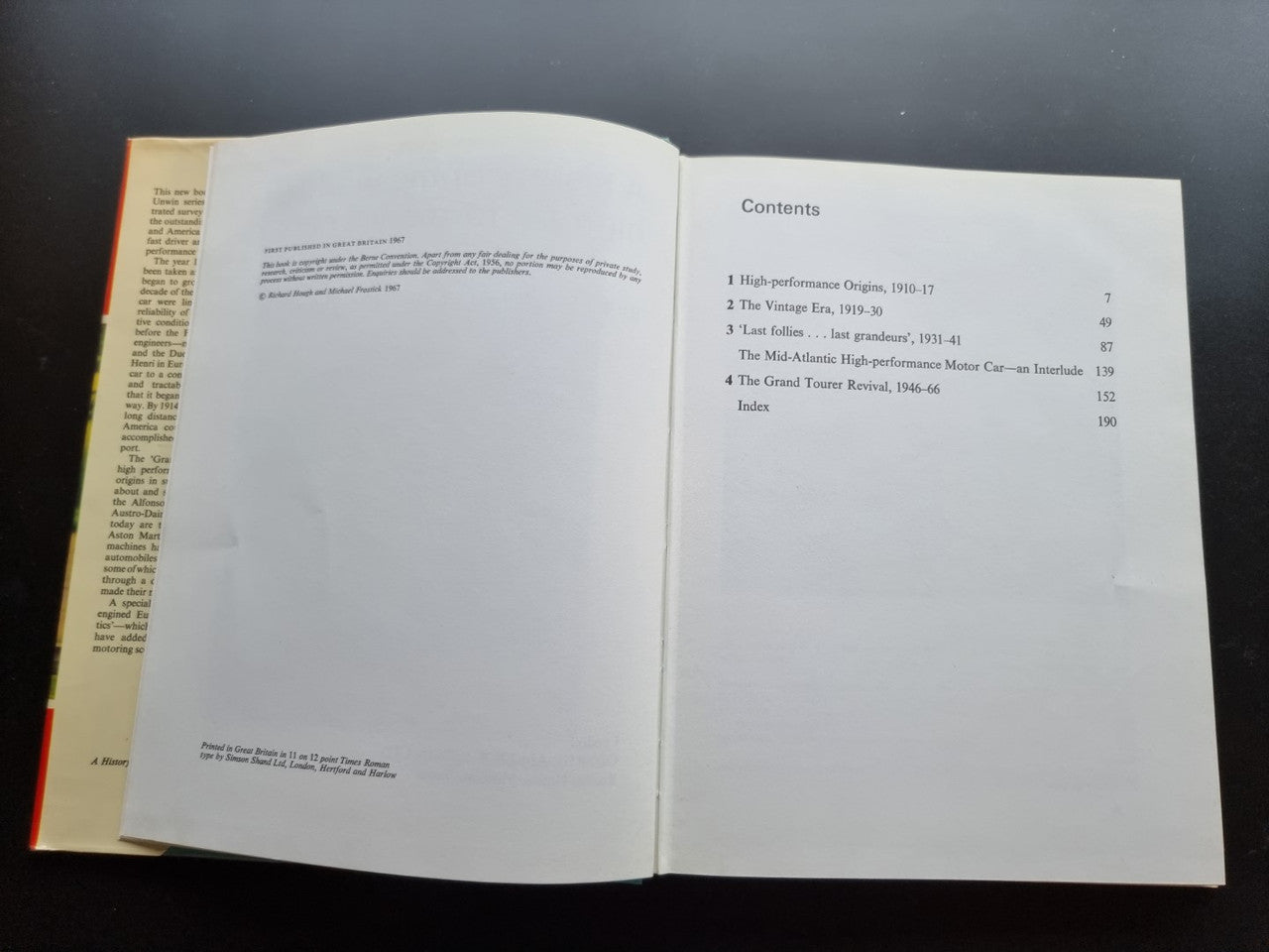Open book with a contents page listing chapters and page numbers.