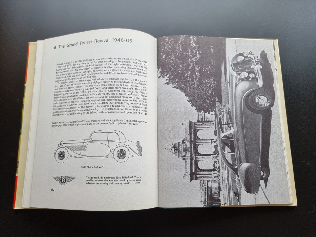 Open book pages with text and black-and-white illustrations of a vintage car and engine.