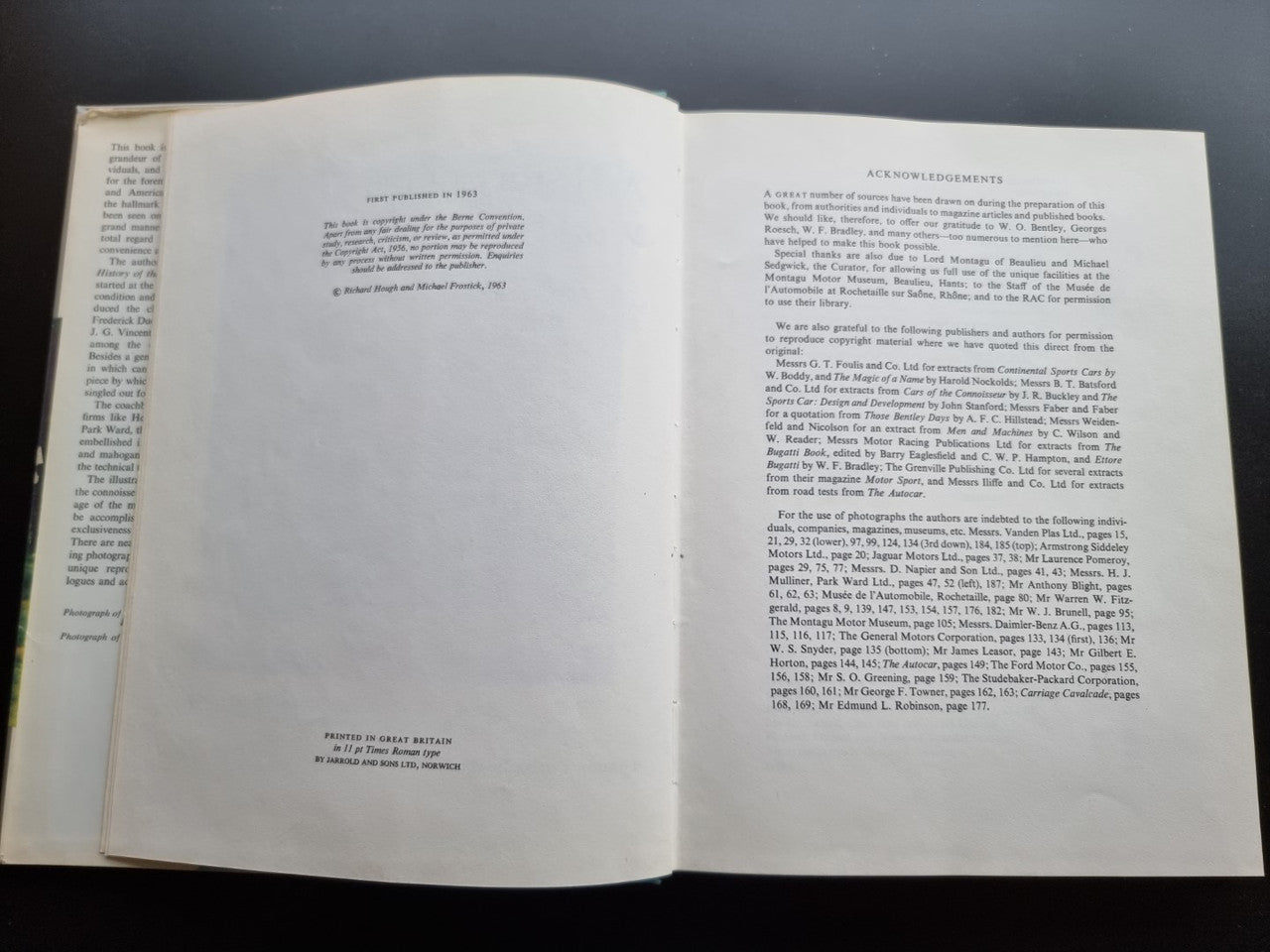 Classic car history book open to two pages of text paragraphs