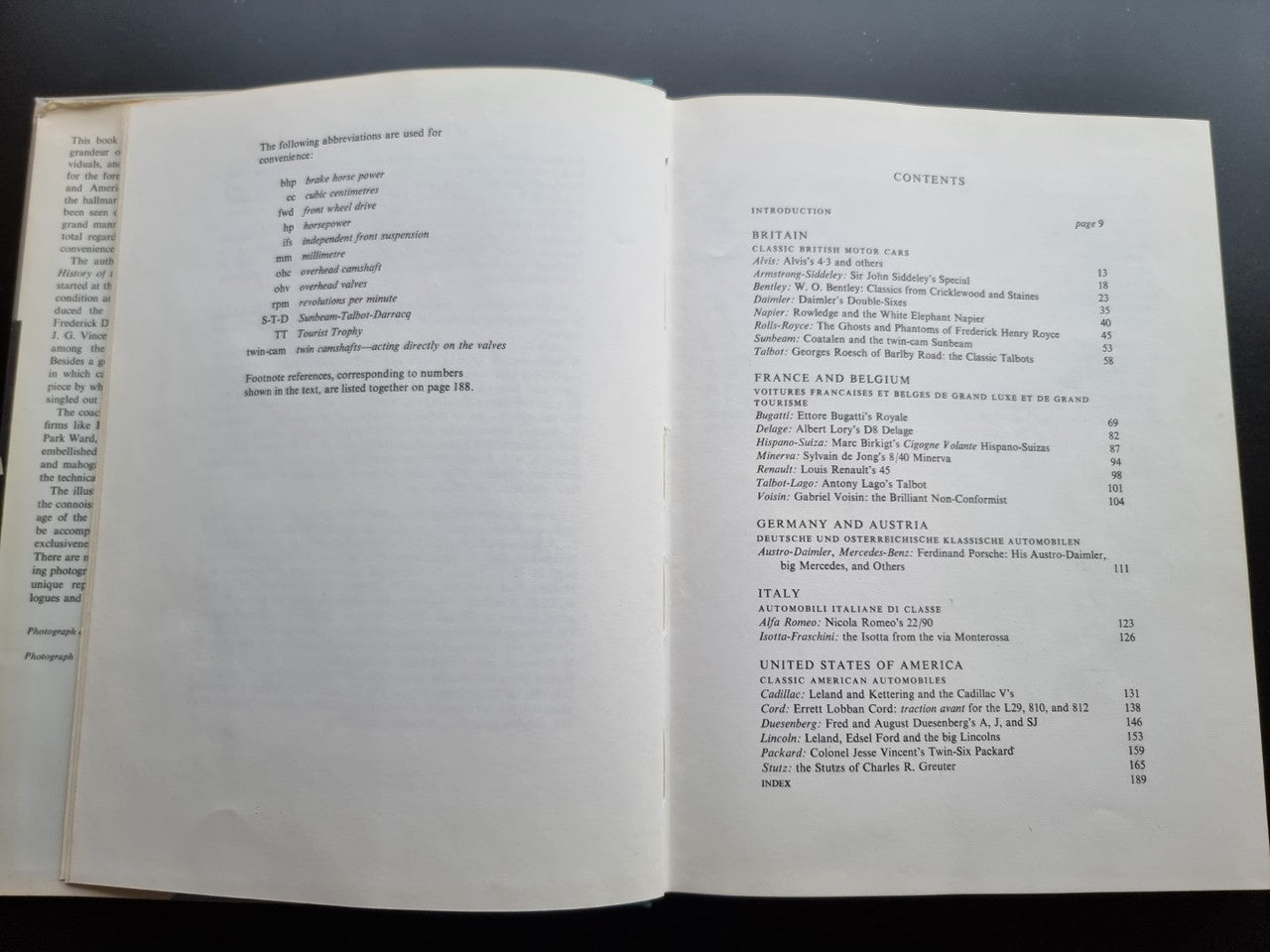 Classic car history book open to contents page with country headings