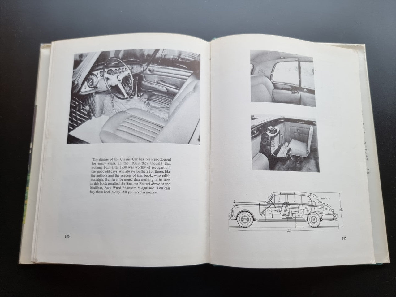 Classic car history book open to interior photos and a side-profile sketch