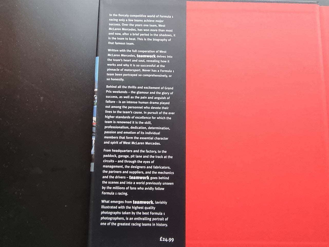 Formula One team biography book, open pages with red right-side section
