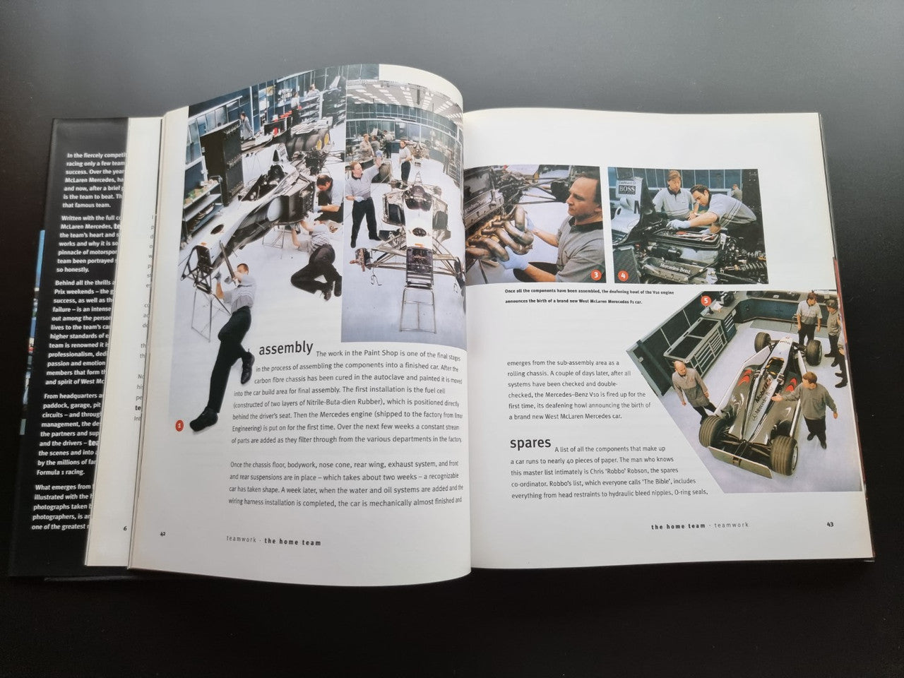 Formula One team biography book, open spread with diagrams and spare parts photo