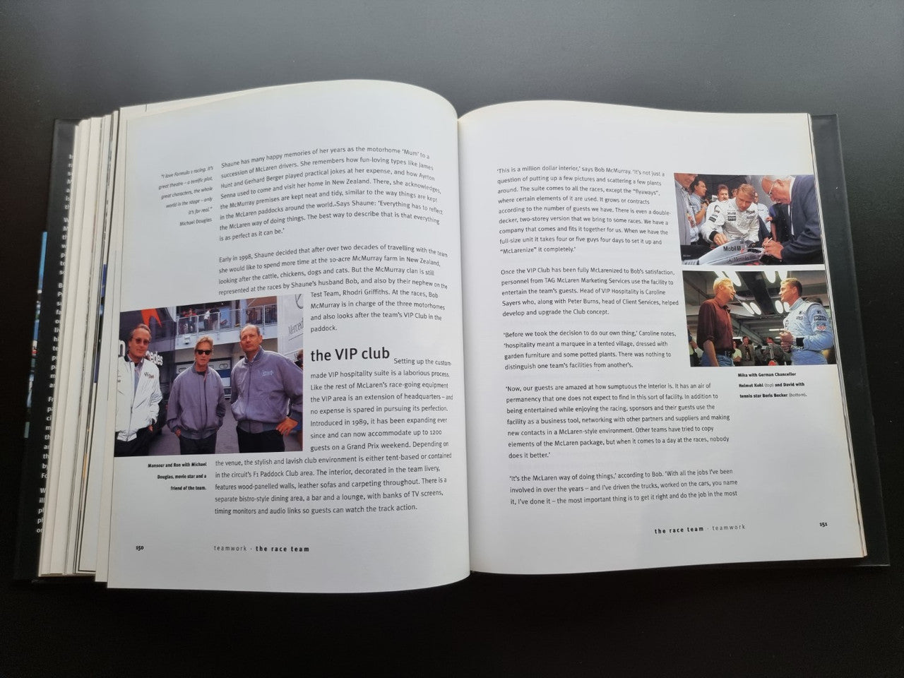 Open biography book with printed text pages and small team photos on right