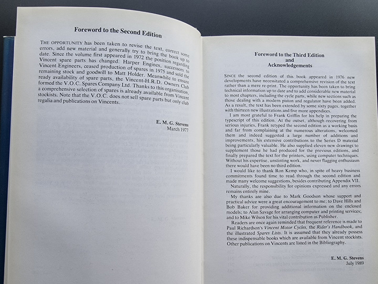 Motorcycle workshop book open to foreword pages with author notes