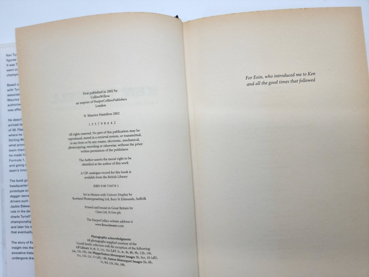 Book open to pages with dense paragraphs and small section headings