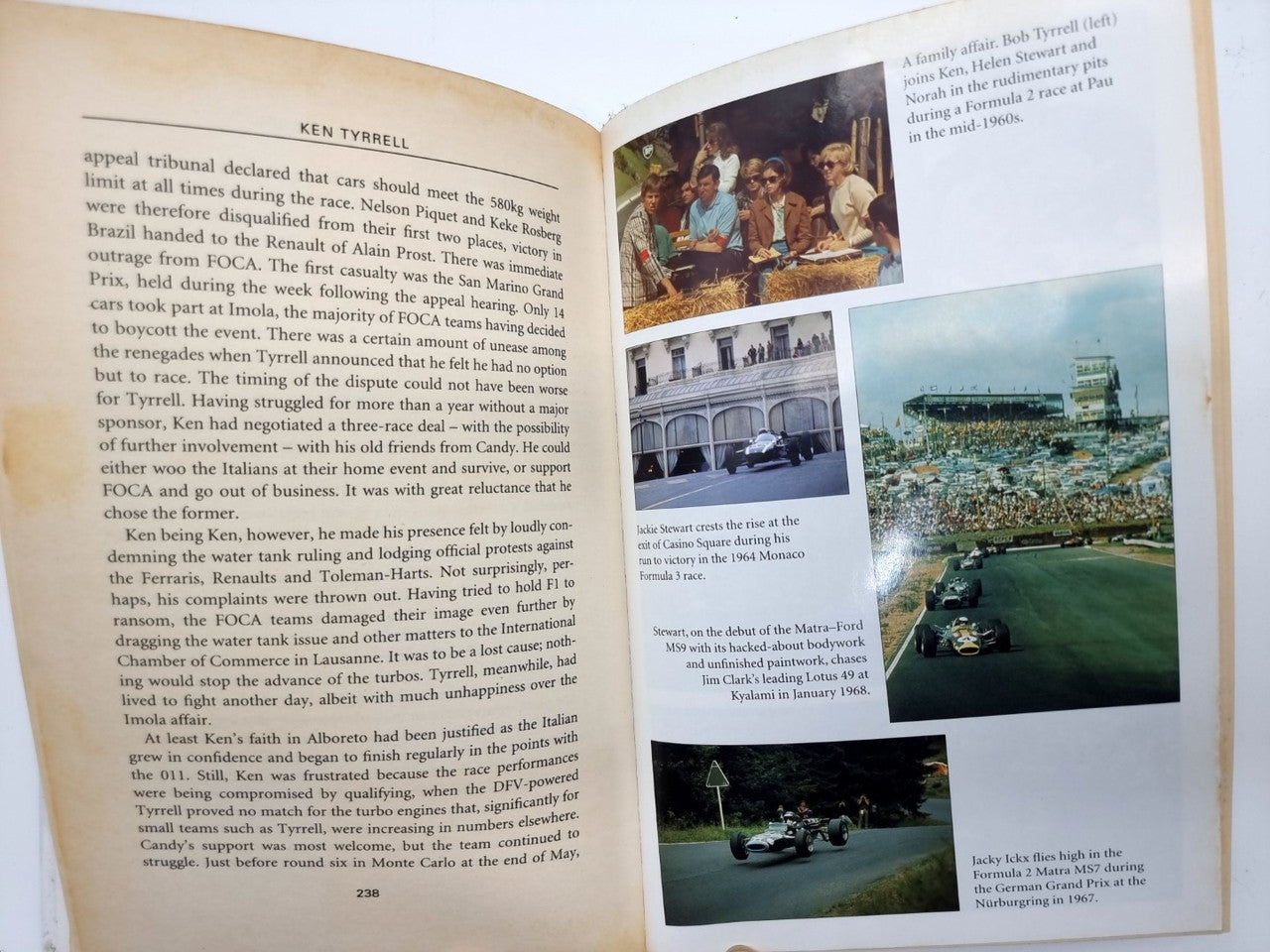 Open biography book page with dense text and color photo collage on right