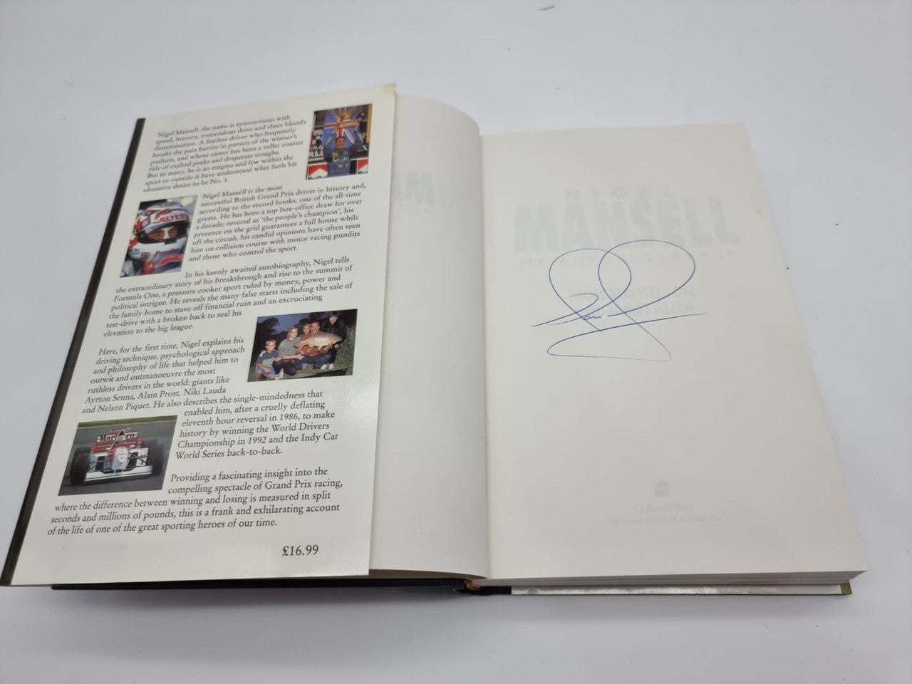 Autobiography book open to signature page with printed text on both sides