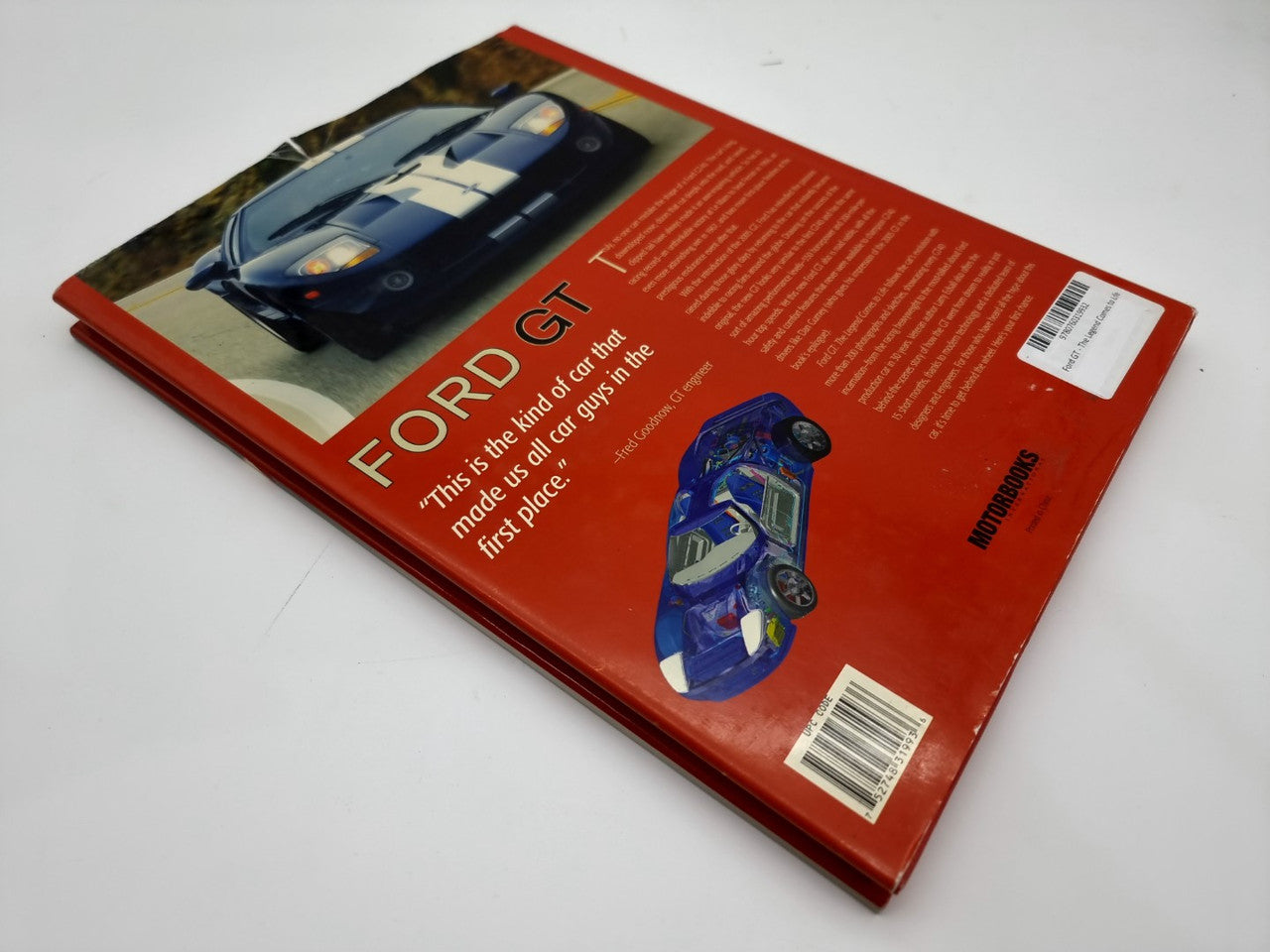 Hardcover Ford GT book with red cover, car photo, barcode, and title text