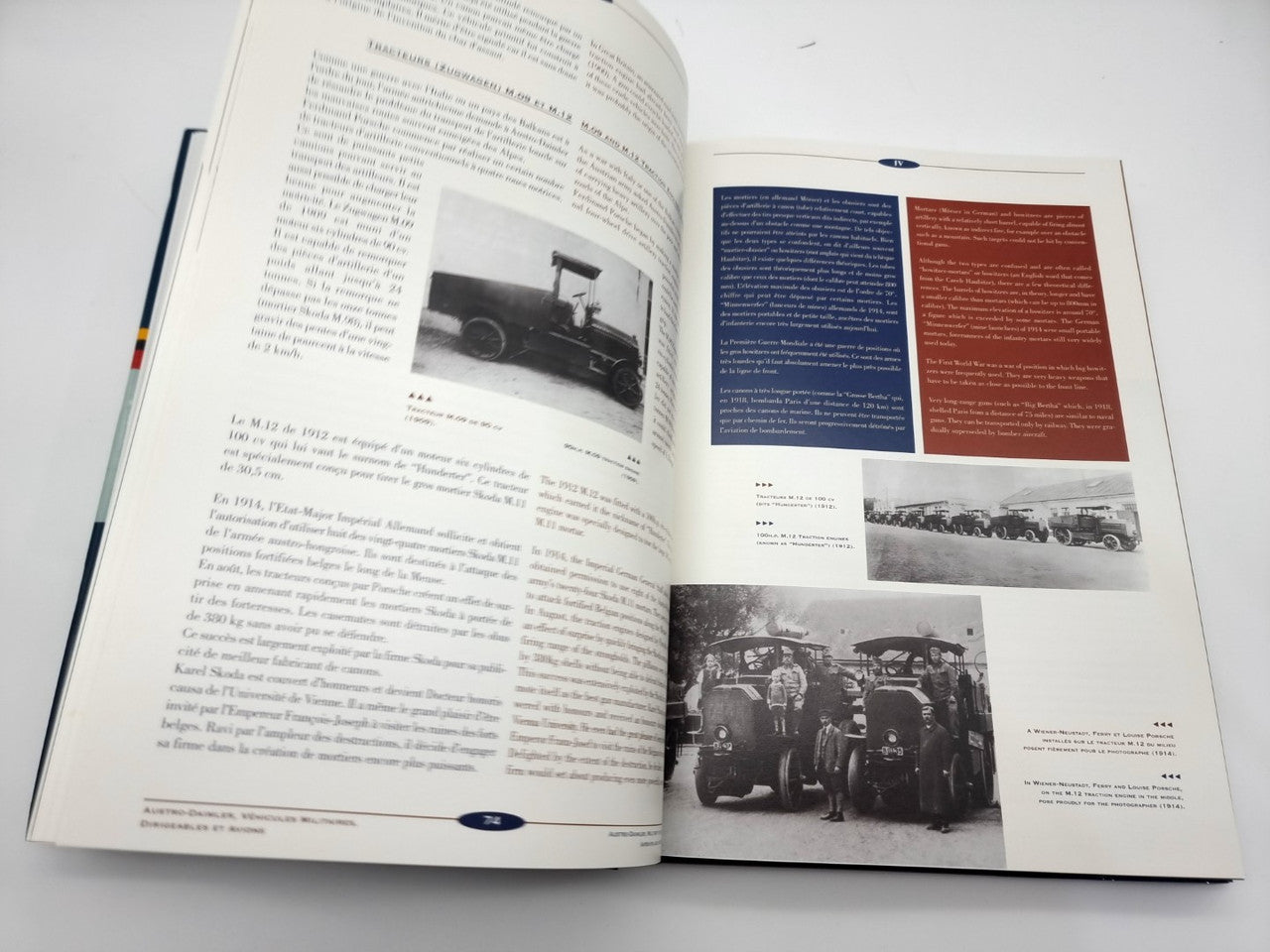 Open hardcover book showing text paragraphs with photo panels in blue and red blocks