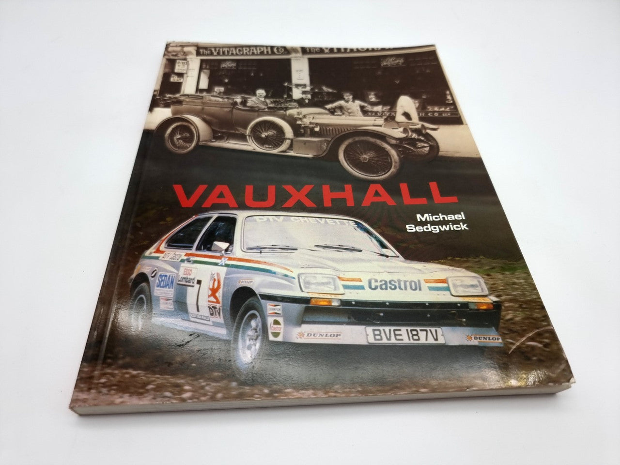 Vintage car book cover with red title and Castrol rally car; Michael Sedgwick