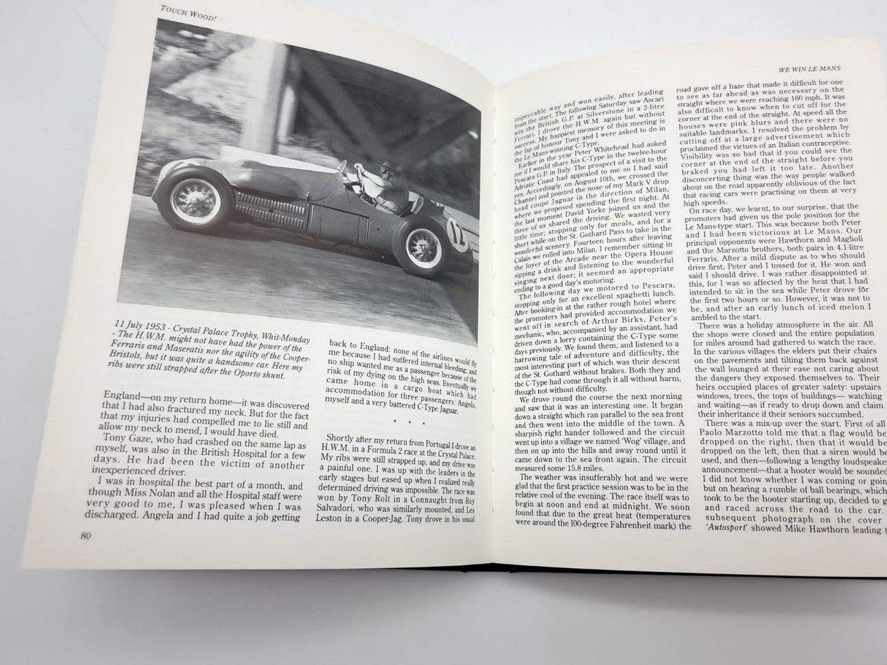 Open book spread with black-and-white car photo and paragraphs