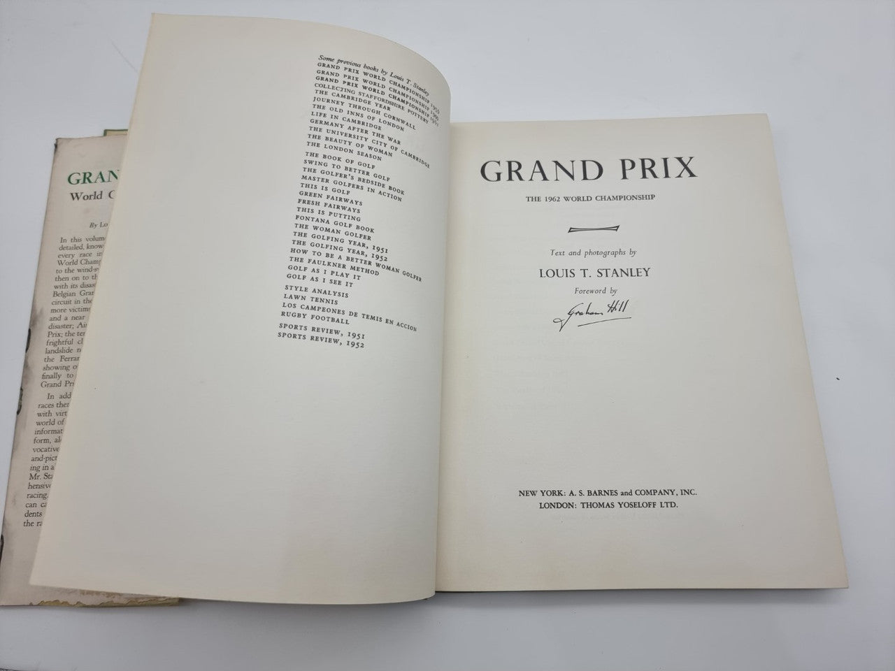 Vintage racing book opened to title page and back pages with publisher imprint