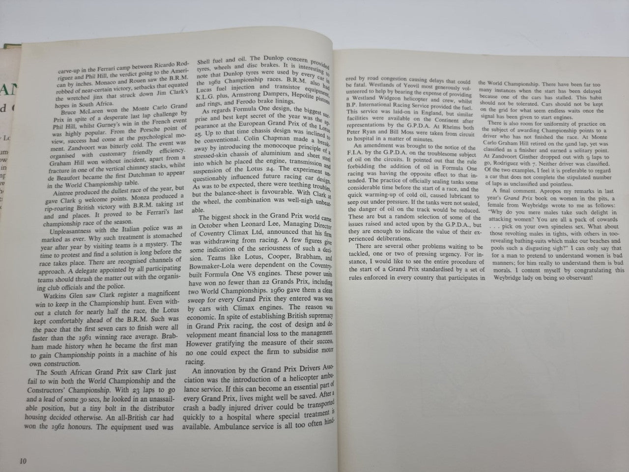 Vintage racing book spread filled with dense printed text paragraphs