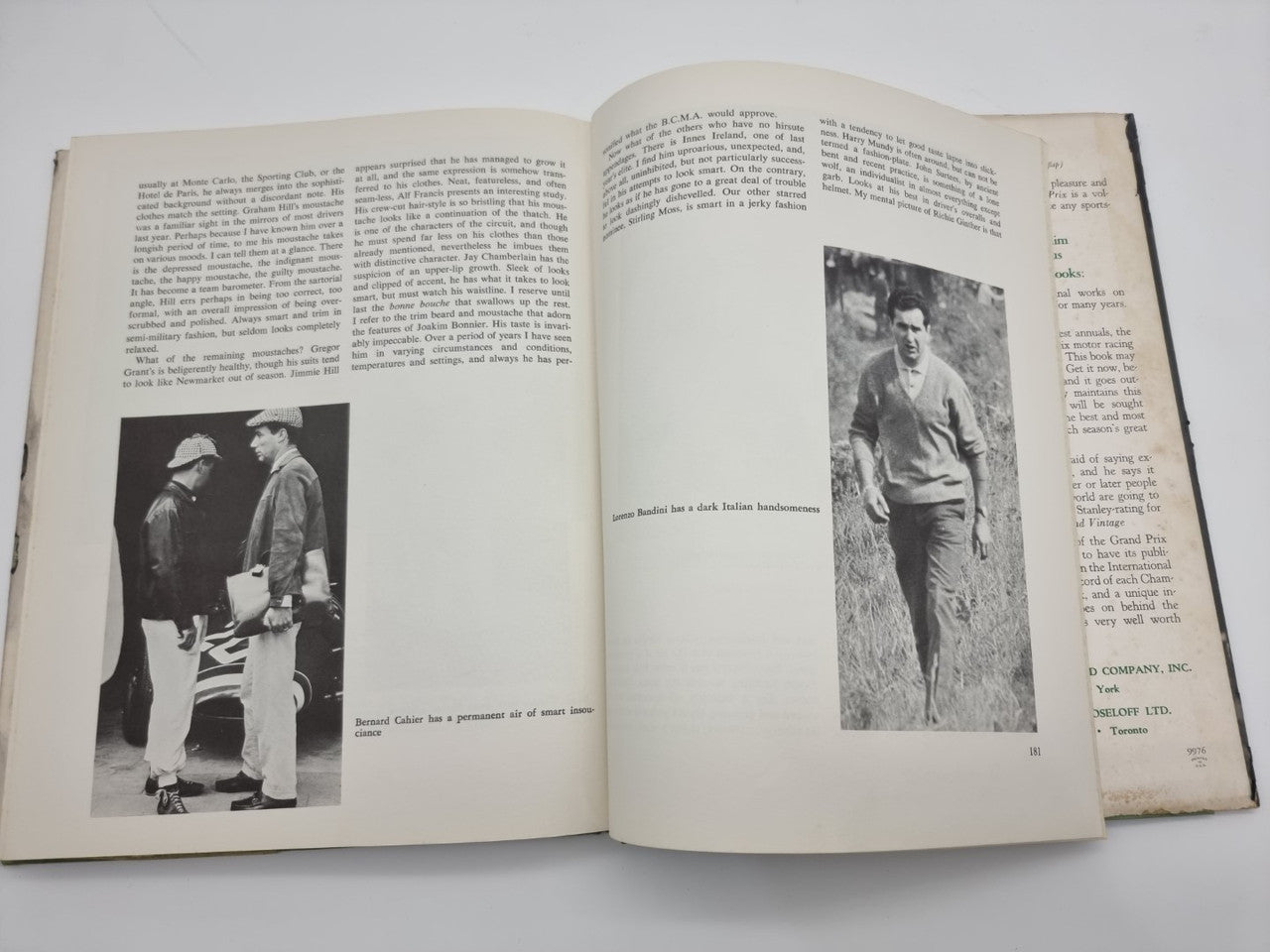 Vintage racing book opened to two pages with black-and-white photos and text columns
