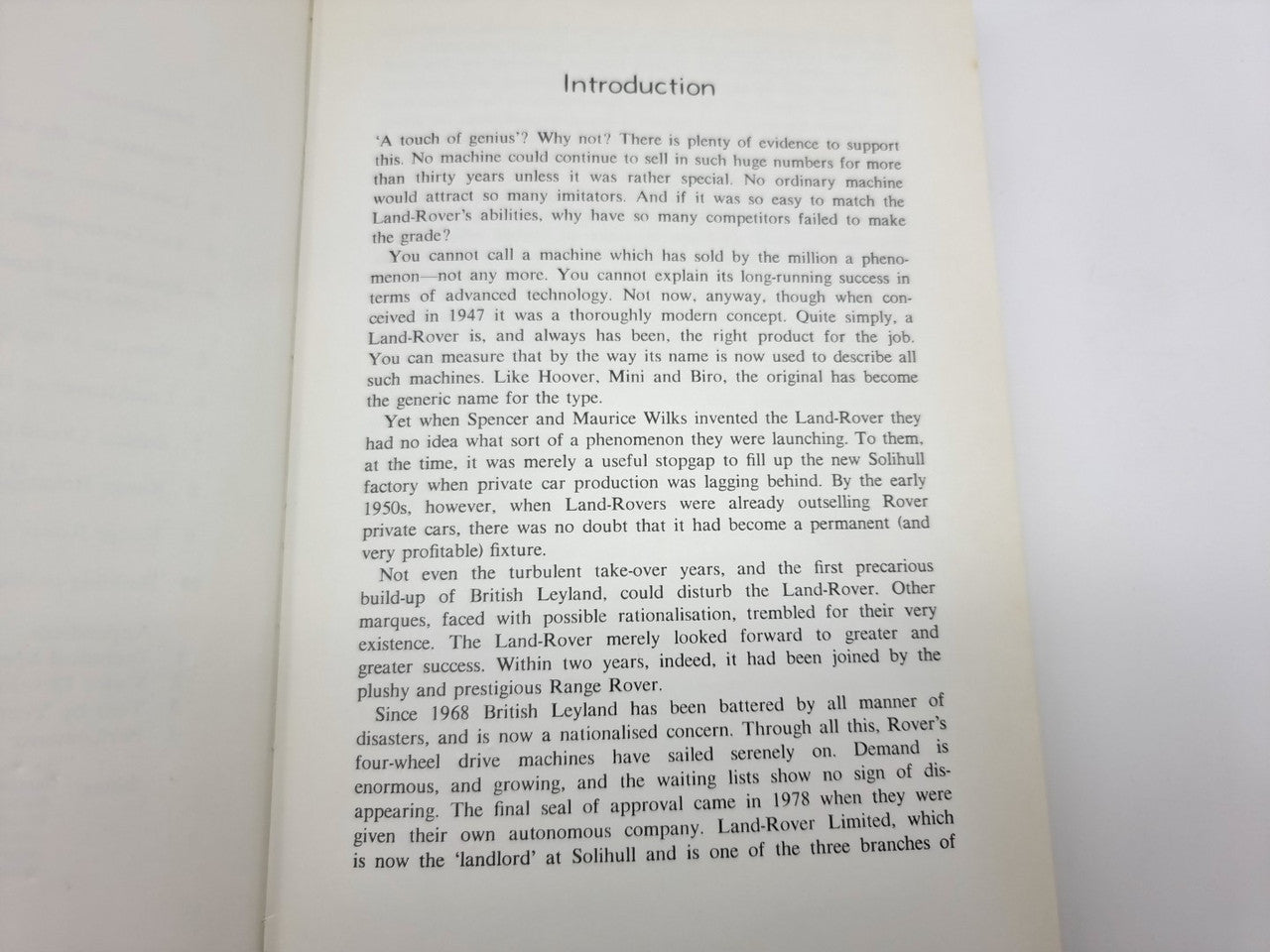 Book open to the “Introduction” section with paragraphs in black ink