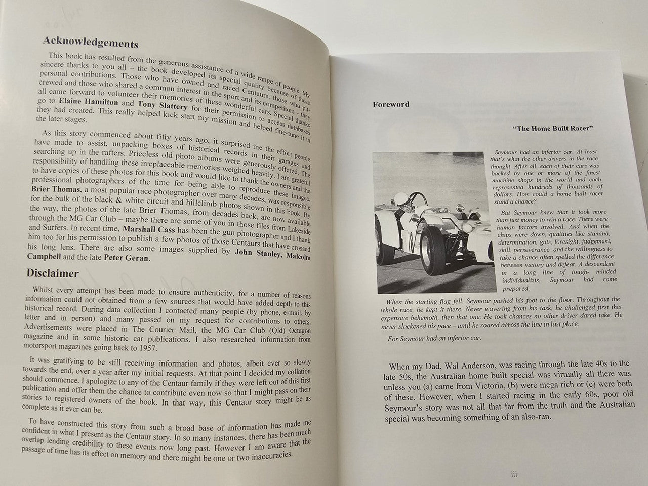 Book pages with acknowledgements and forward sections plus small car photo