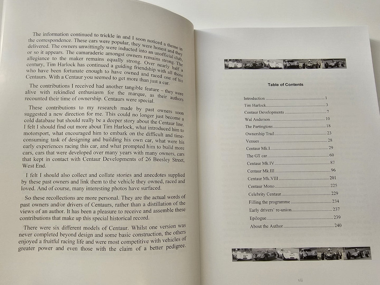 Signed motorsport history book, open pages with text and table of contents.