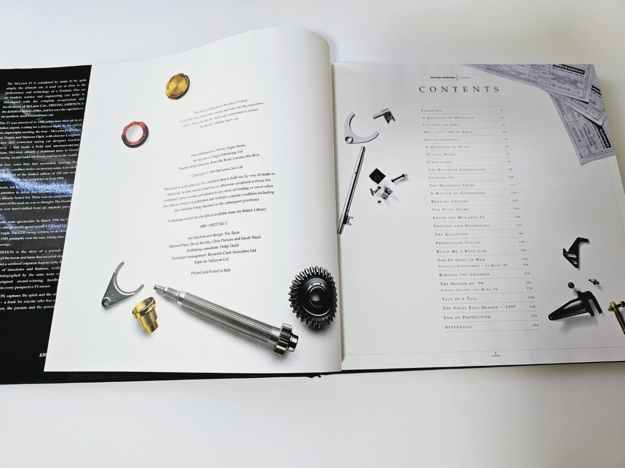 Open book spread with car parts illustrations and a 'Contents' page listing topics