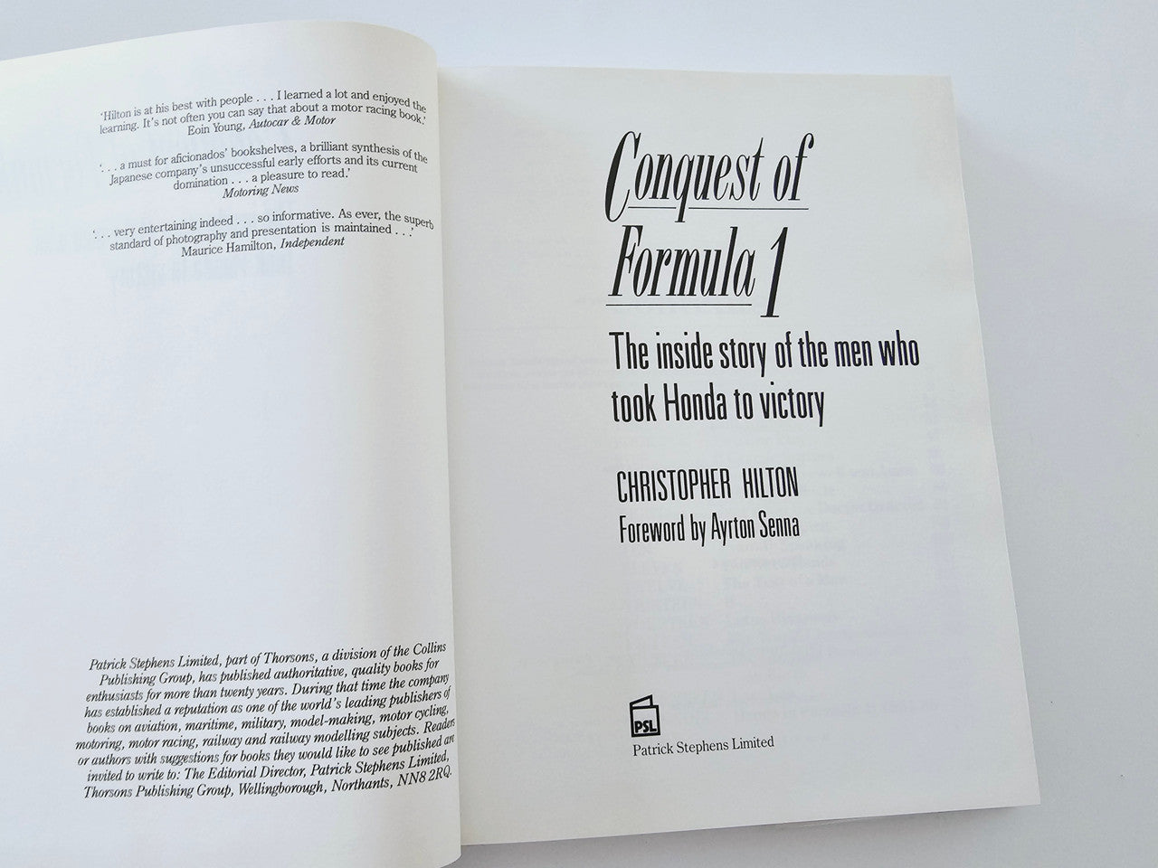 Open book showing the title page for Conquest of Formula 1 and author name