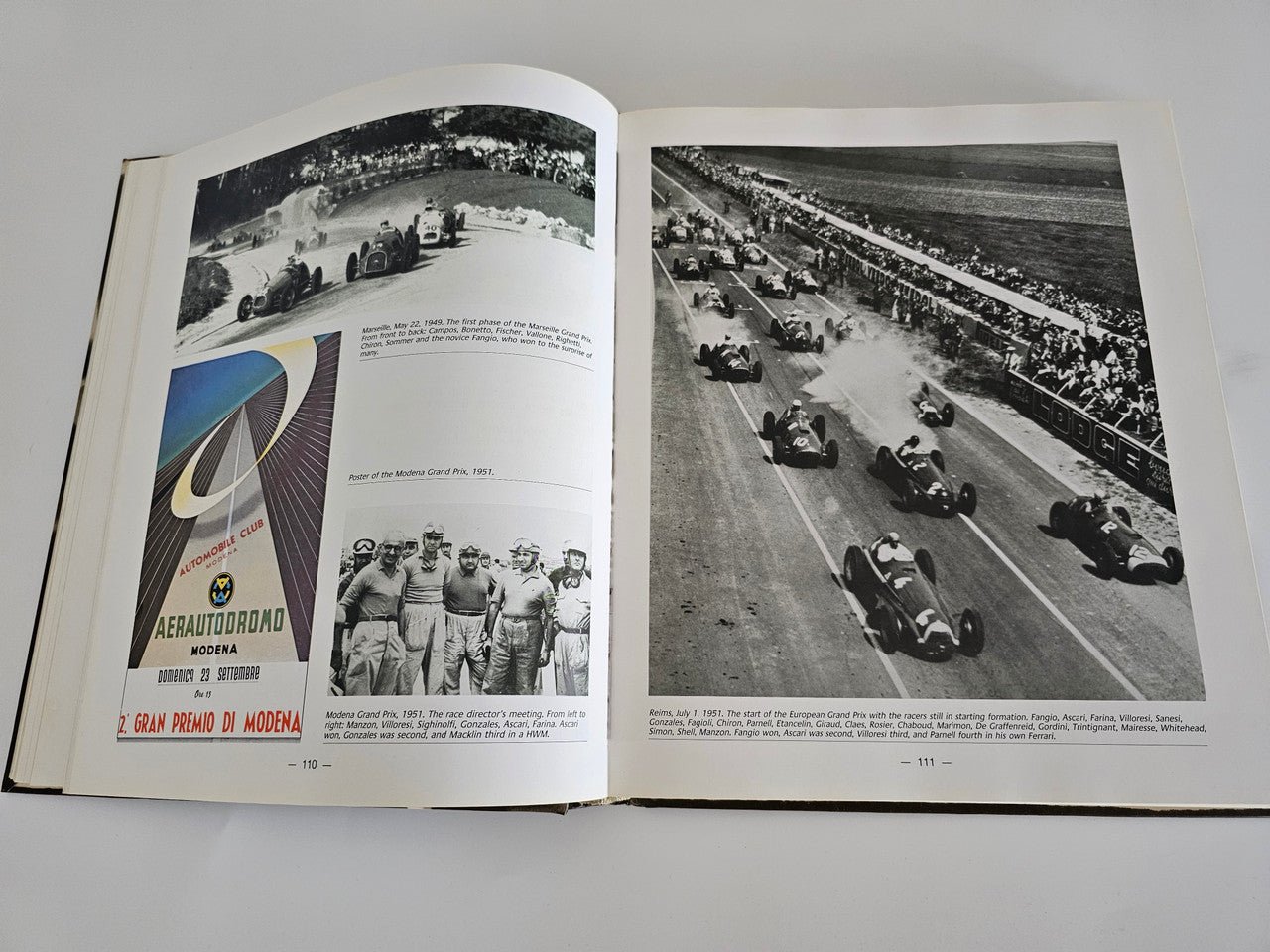 Enzo Ferrari pilots book, open spread with black-and-white race cars on track