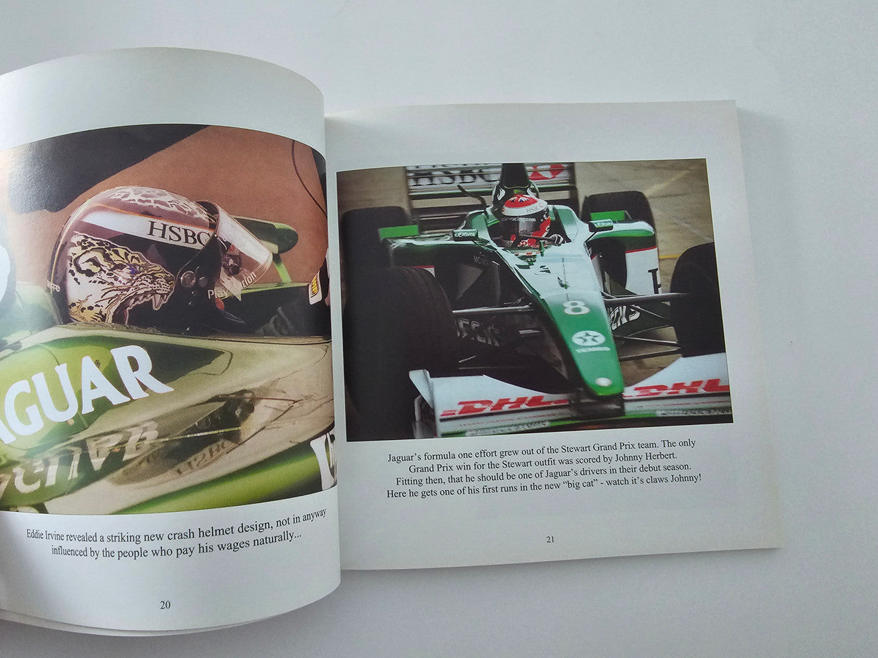 Open book spread with racing helmet close-up on left and green race car photo on right