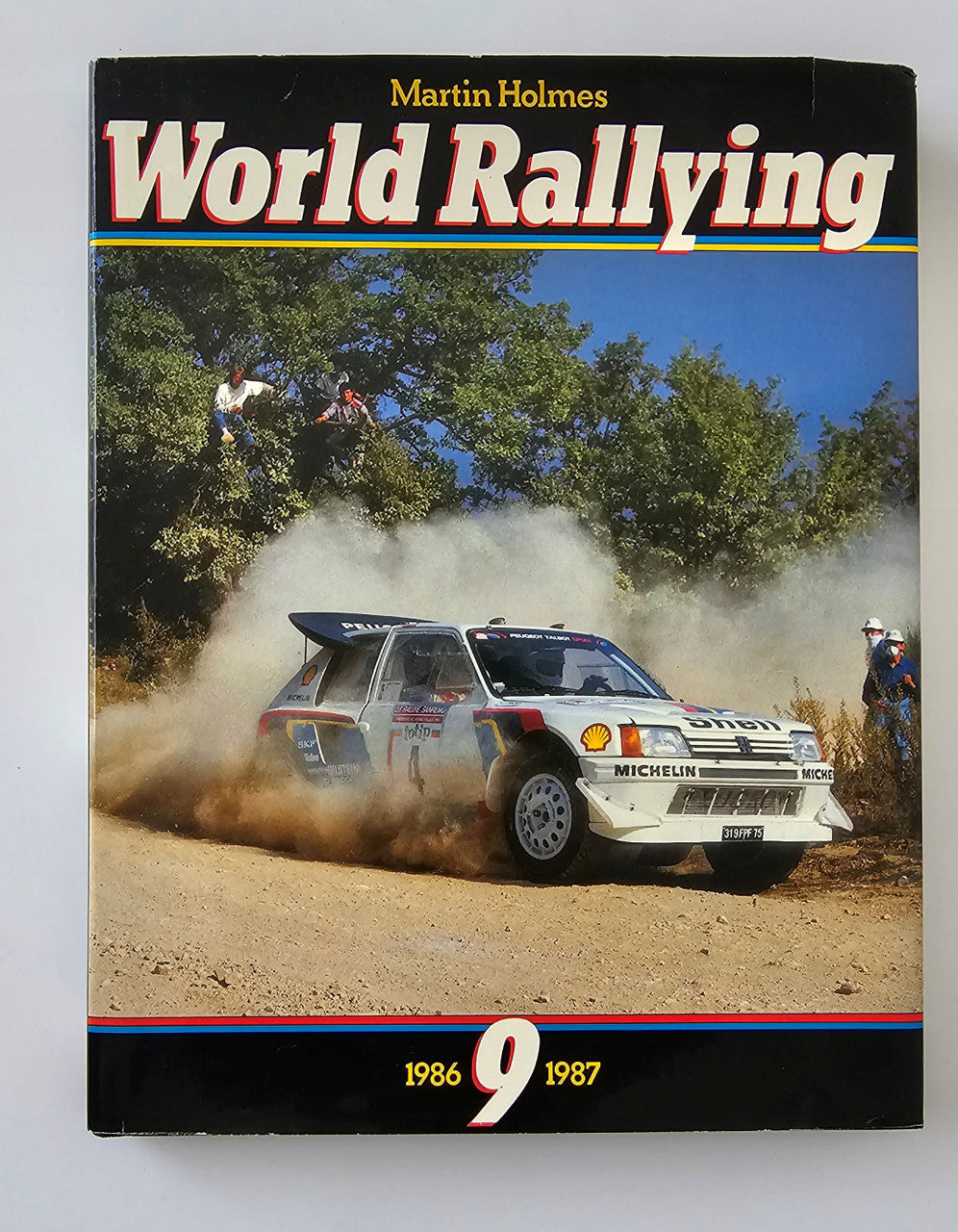 Rallying book cover with racing car action shot and “World Rallying 9” title