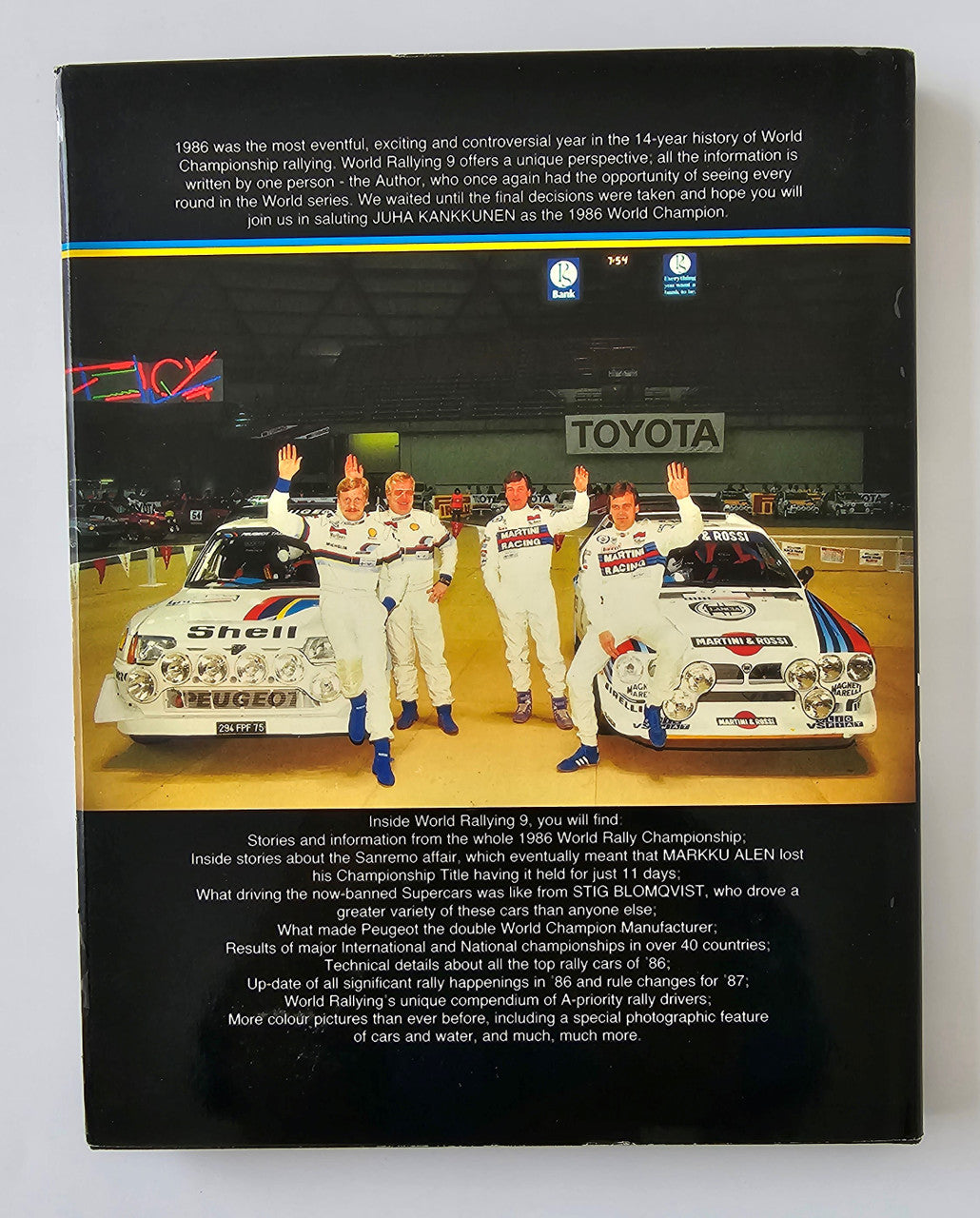 Rallying book back cover with group photo in front of race cars and blocks of text