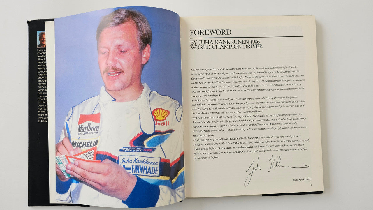 Rallying book open to foreword page with portrait of a race driver and body text