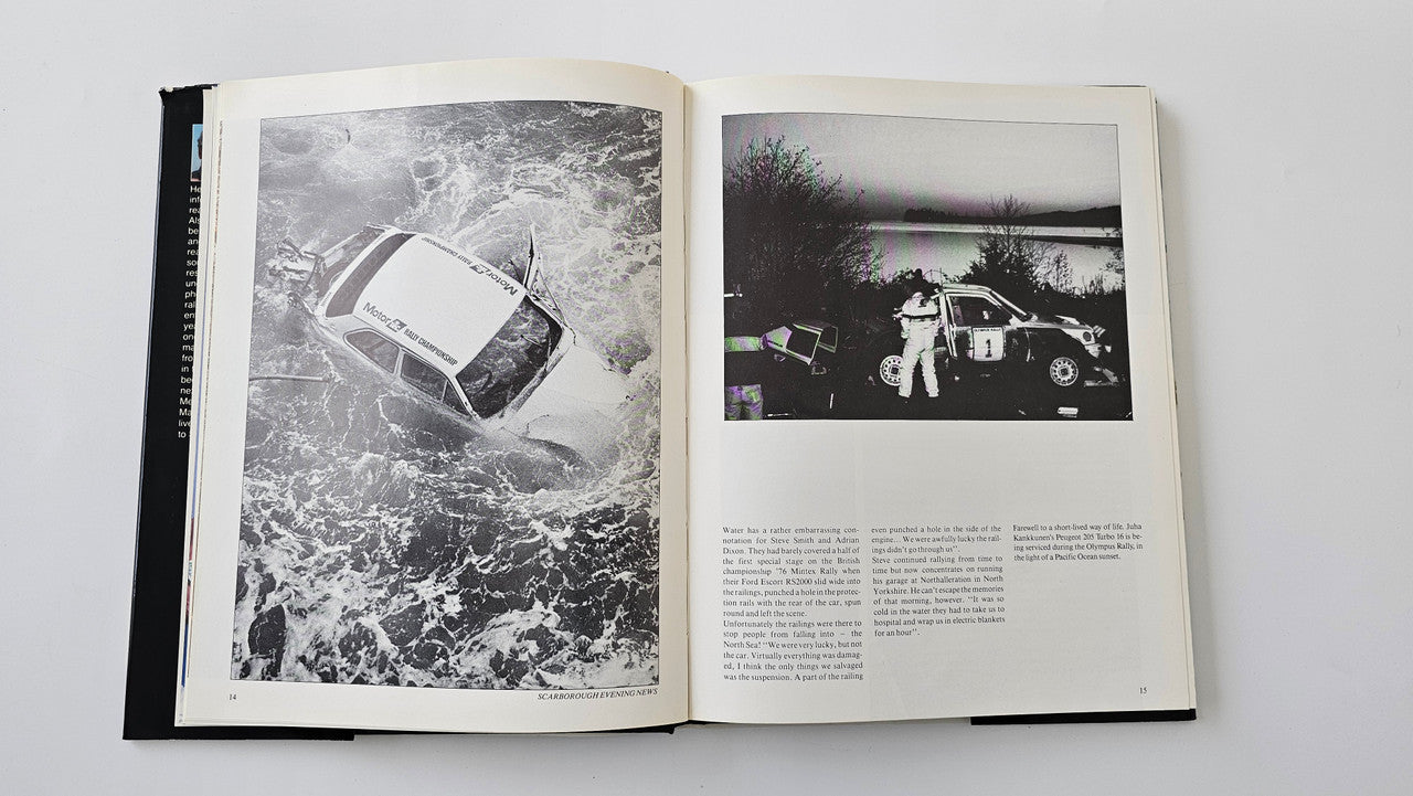 Rallying book open to black-and-white photos with a race car on the left page