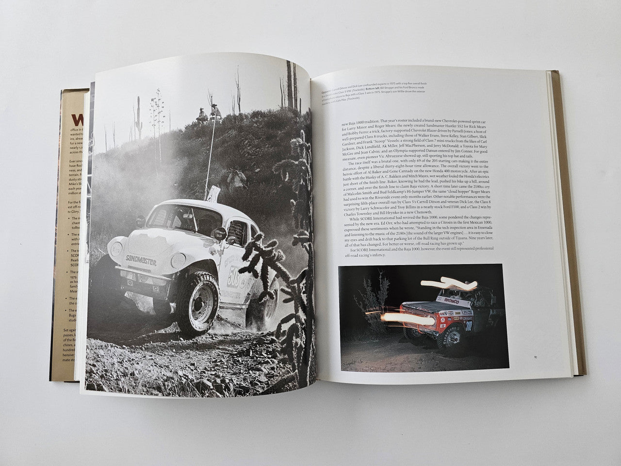 Opened book spread with vintage car action photo on the left and small car image on the right.