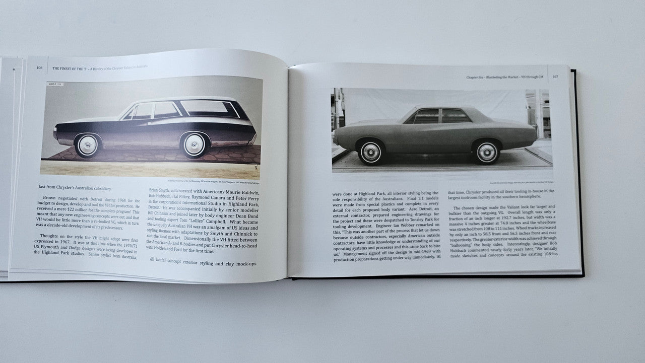 Open hardcover book showing vintage car photos and text captions