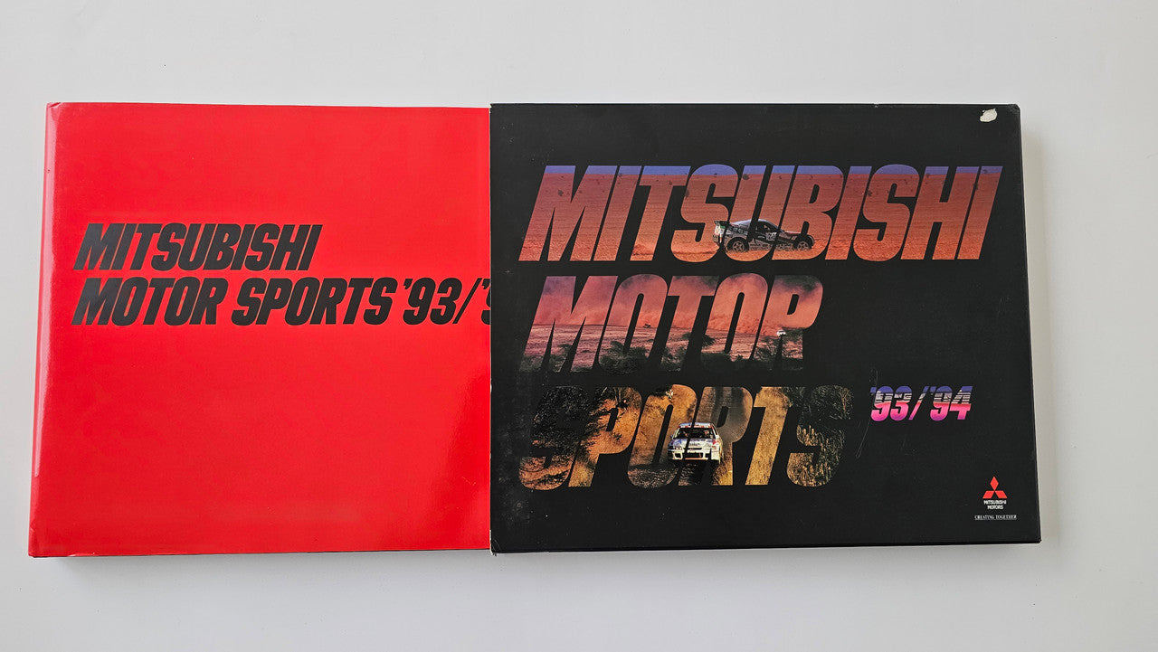 Two-panel racing set cover with red left side and black MITSUBISHI MOTOR SPORTS 93/94 design