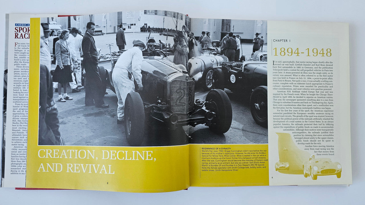 Open sports car racing book with yellow section heading and black-and-white race car photos