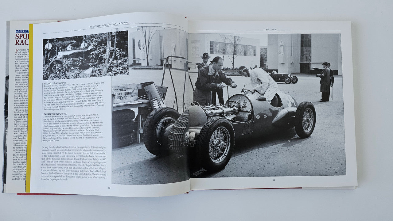 Open sports car racing book with black-and-white car photo and multi-column text