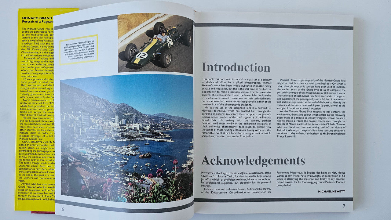 Photo book open to Introduction and Acknowledgements with racing and harbor photos