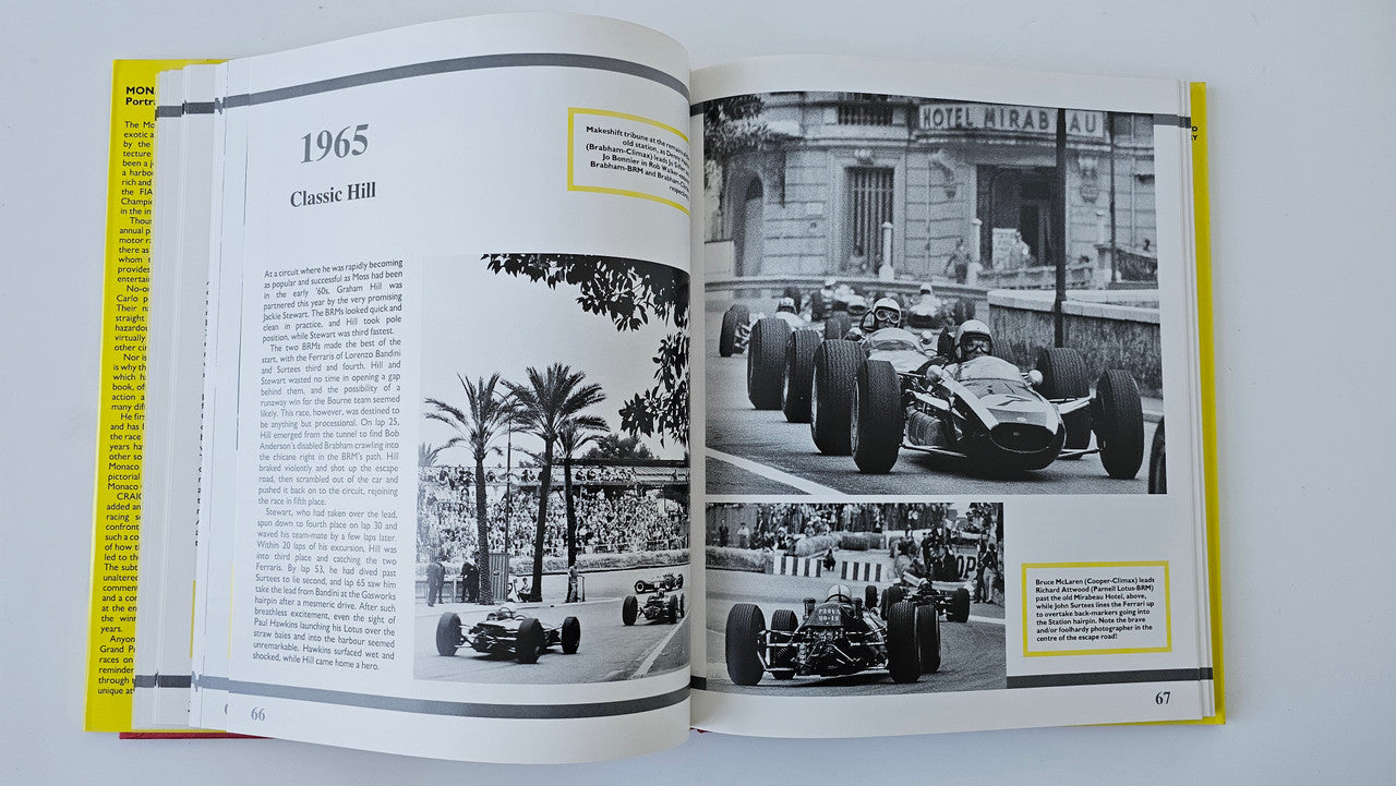 Open motorsport photo book with black-and-white racing cars across two pages