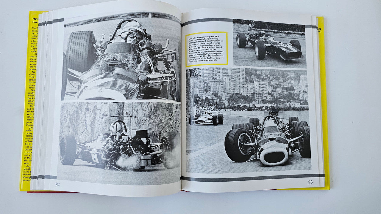 Open motorsport photo book with black-and-white race car photos on both pages