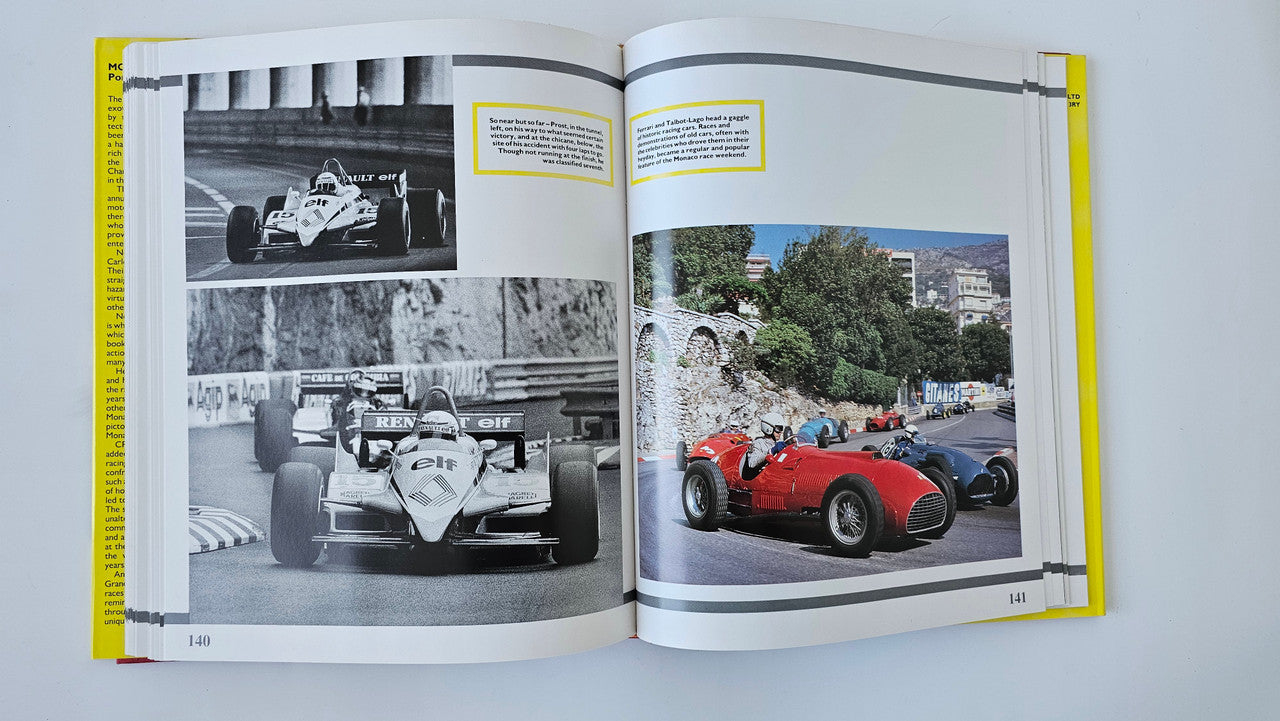 Open motorsport photo book with vintage cars photo spread, including red car on right