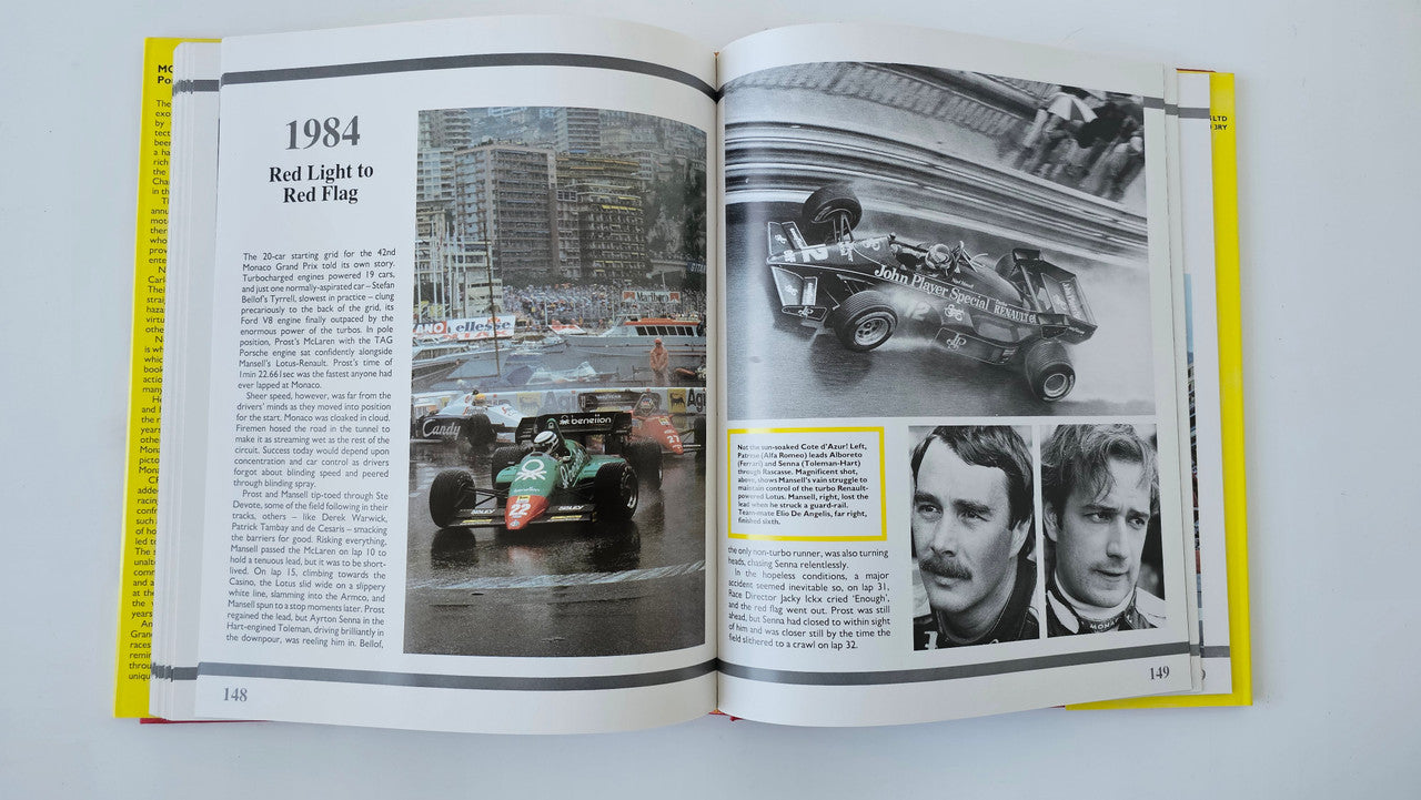 Photo book open to a racing page with red-and-green car and black-and-white portraits
