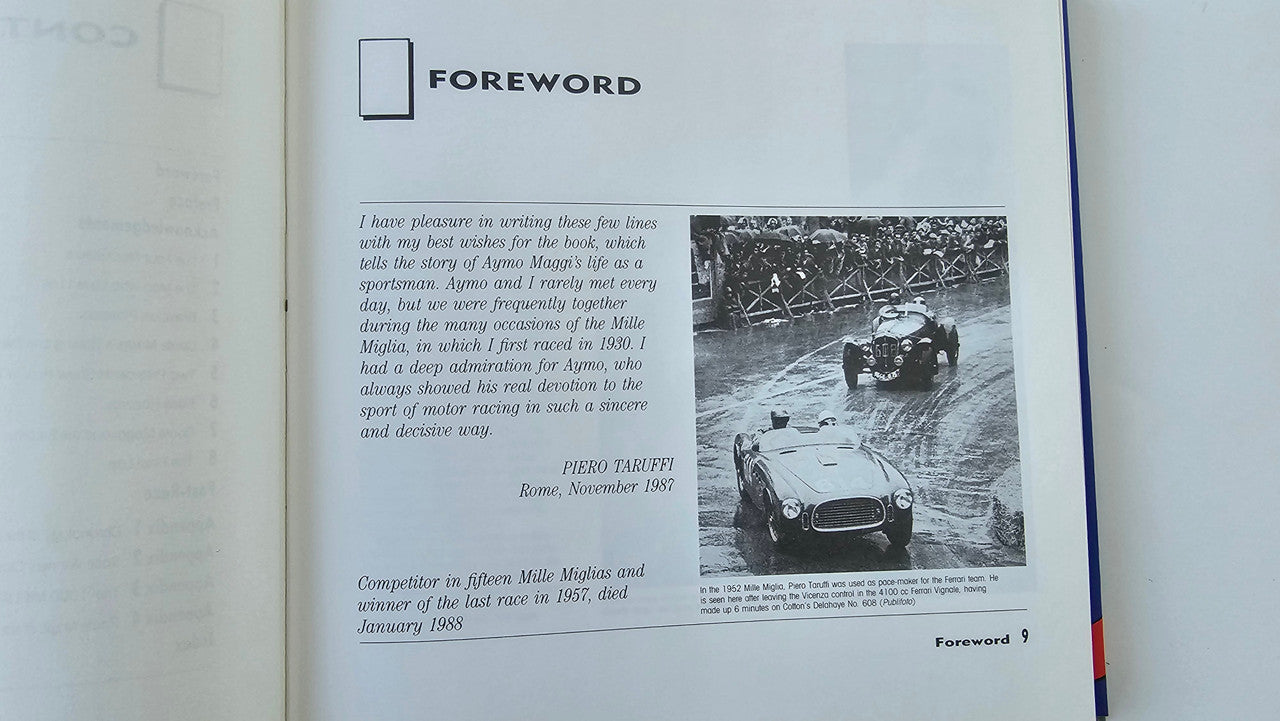 Open book page with Foreword section and black-and-white race car photo