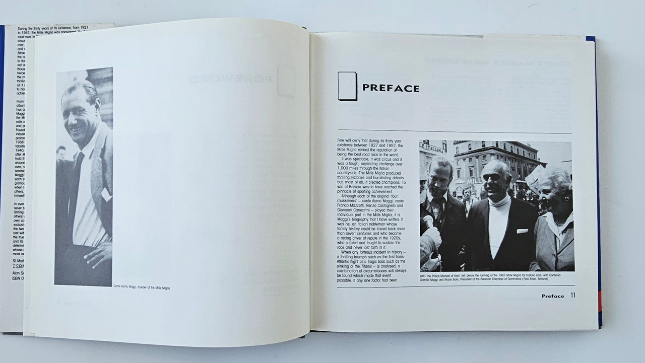 Open hardcover book page with 'PREFACE' heading and black-and-white photo