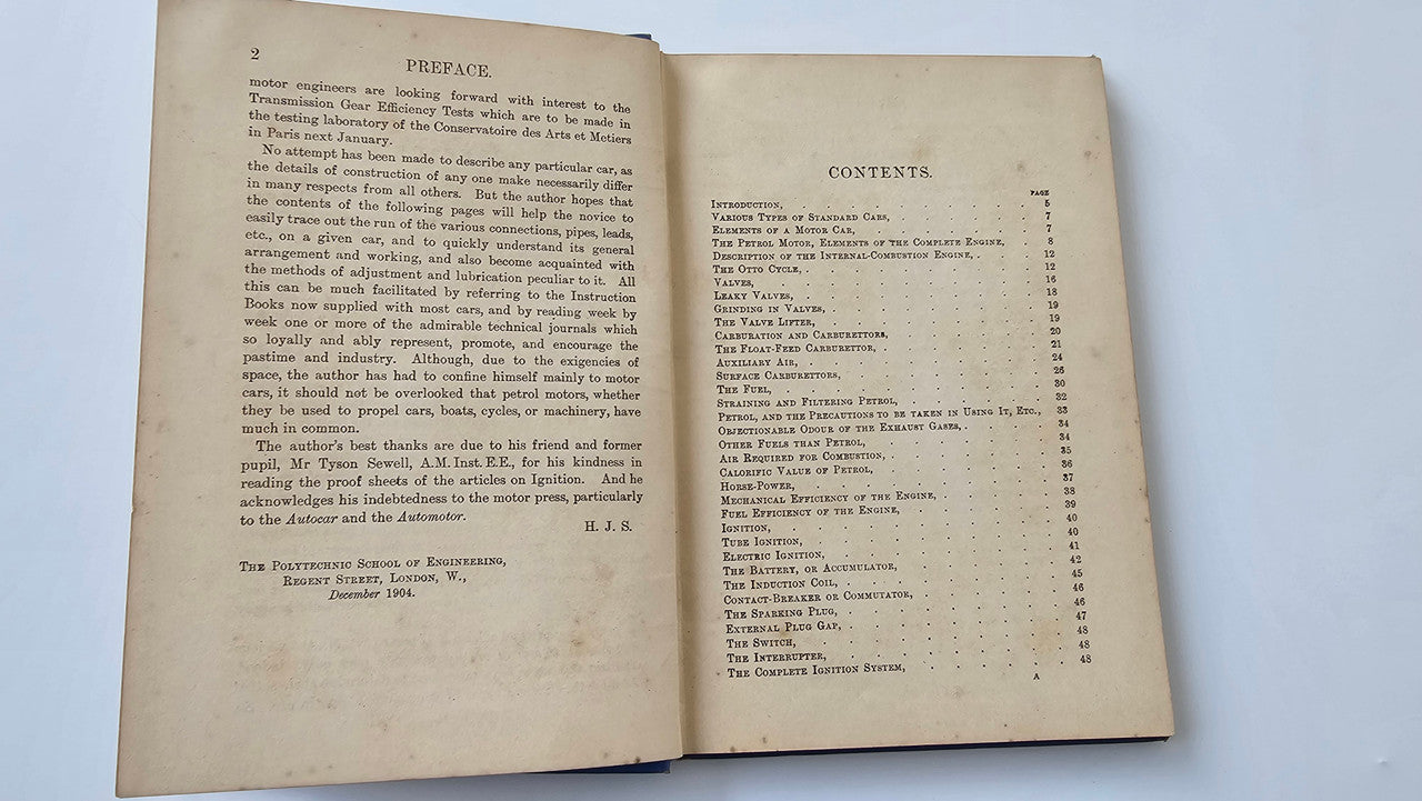Motors and Motoring book open: 'Preface' and 'Contests' text pages