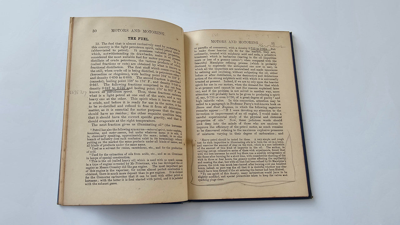 Motors and Motoring book open: two-page spread of paragraph text