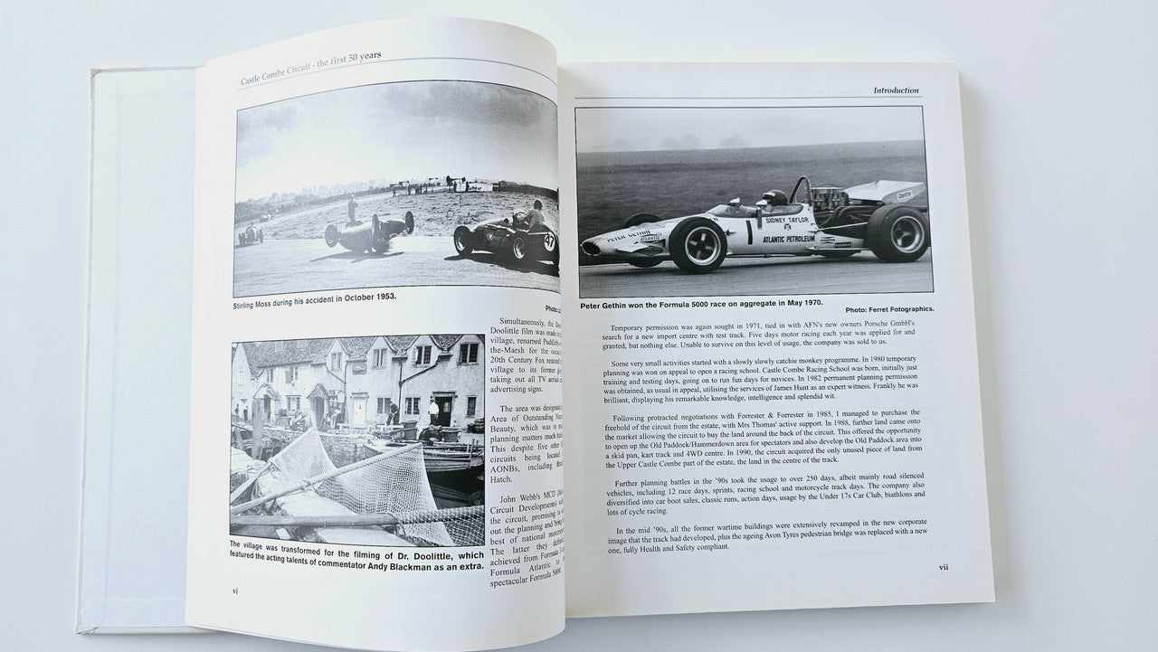 Open book page with two vintage race car photos and printed paragraphs